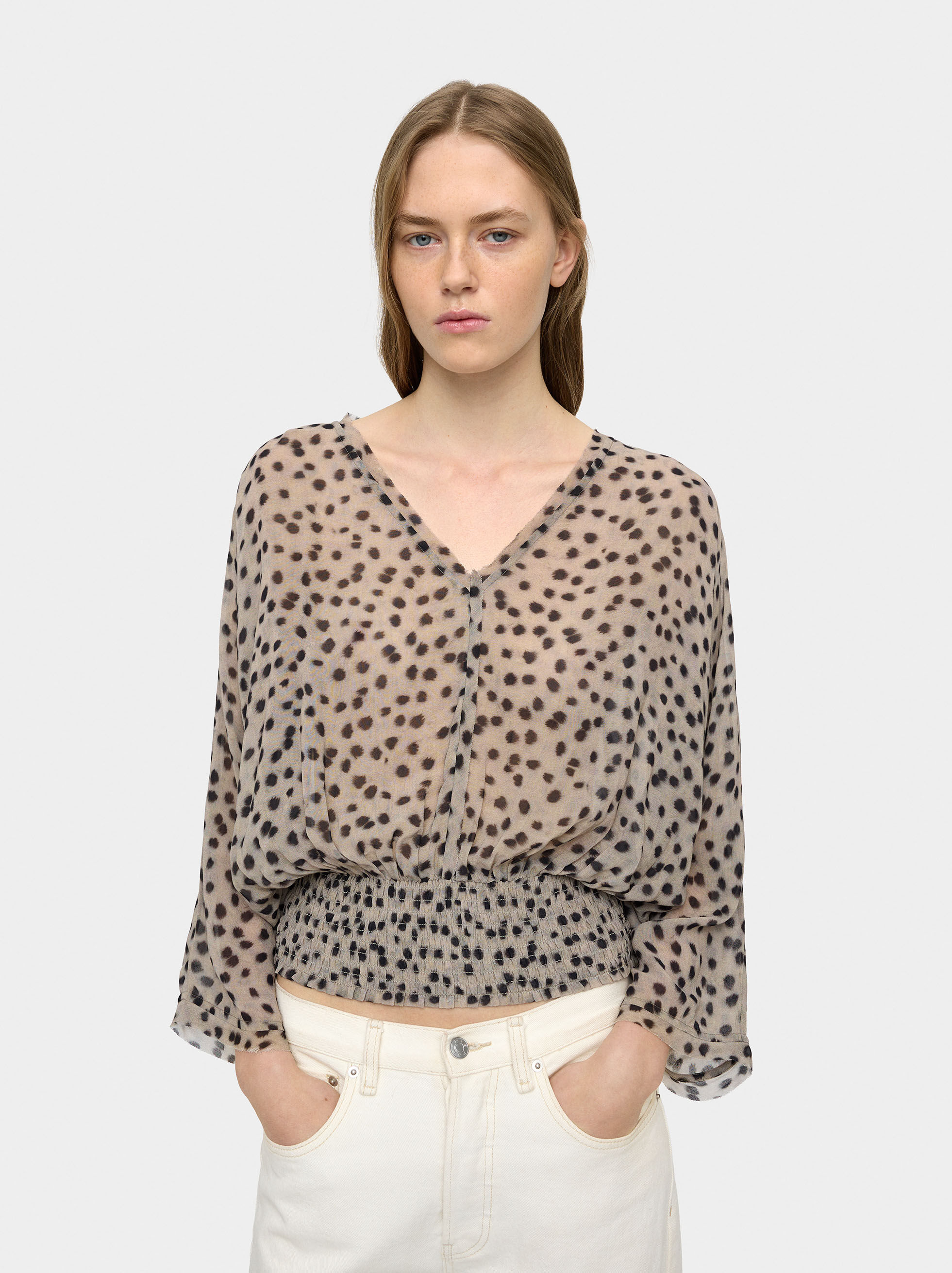 Blusa fluida com elásticos