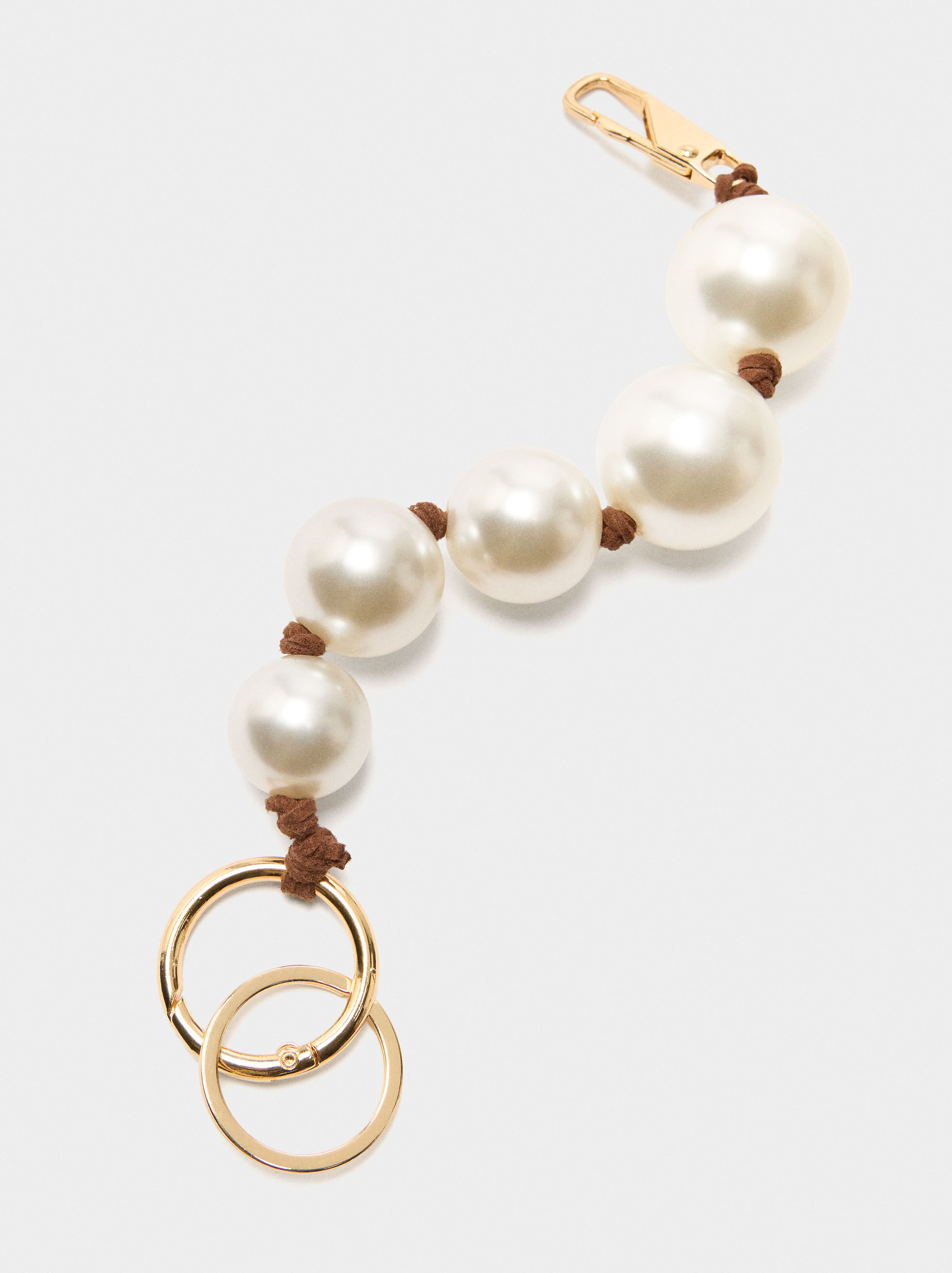 Porta-chaves charm com pérolas